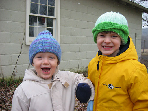 Preston and Amzie outside as snow begins falling